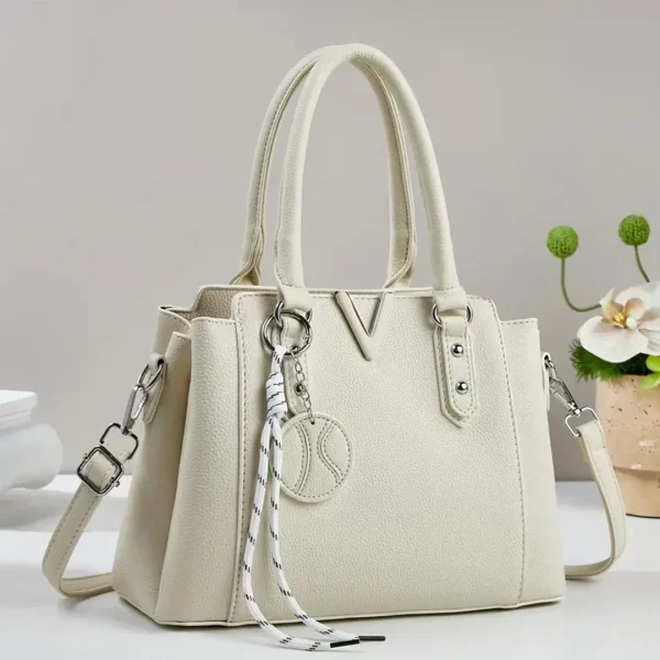 CARTERA V EN TENDENCIA 30X20 CM A2560